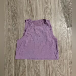 Lululemon cropped purple tank top.